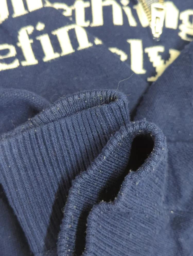 LETTERED HALF ZIP SWEATER