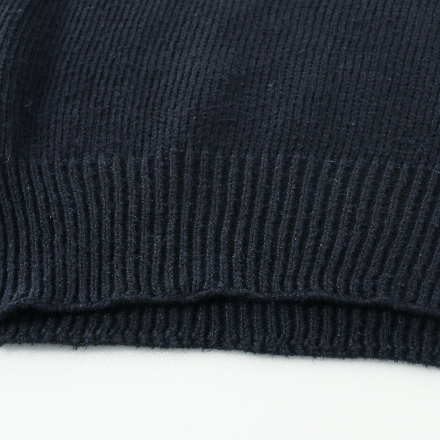 CAST OFF ROLL NECK KNIT