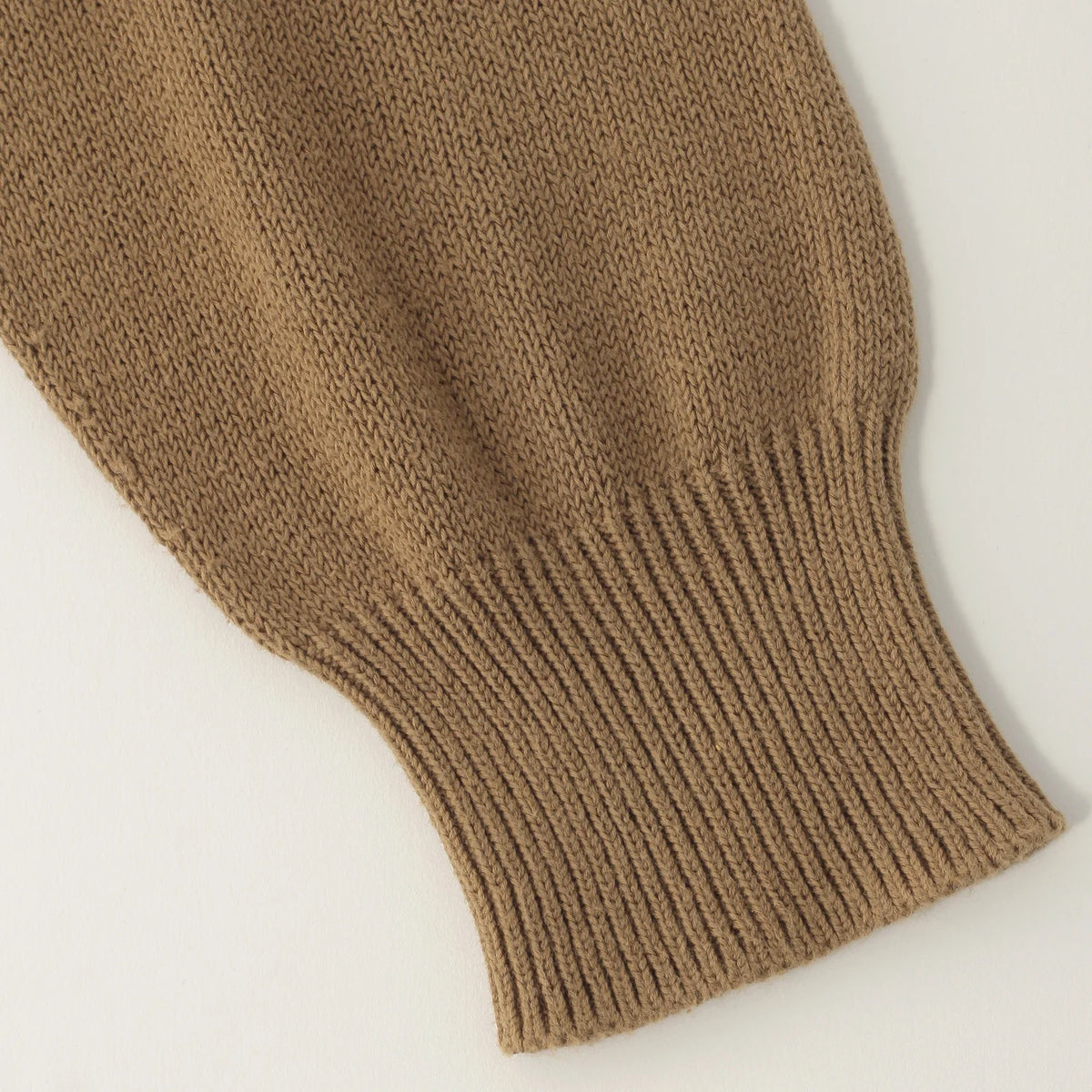 CAST OFF ROLL NECK KNIT