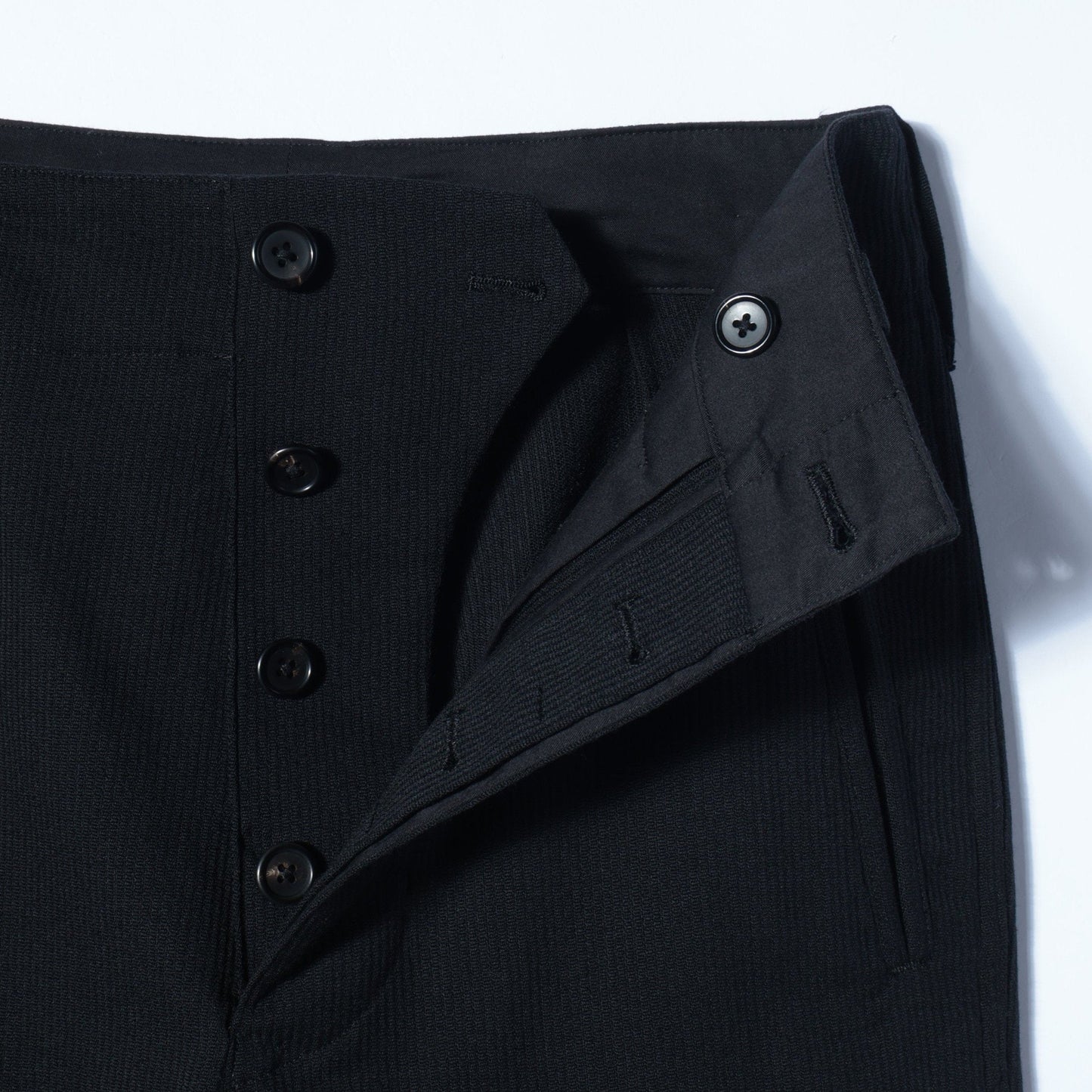 DRY WOOL CORD TROUSERS