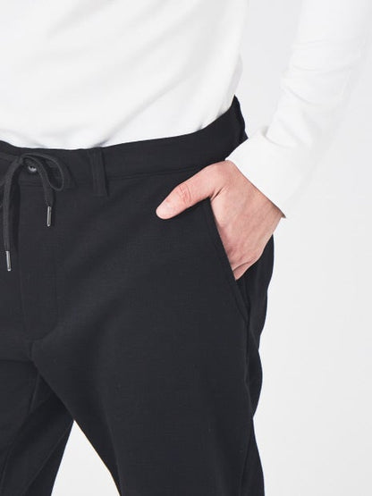 裾ZIP スリムテーパード パンツ