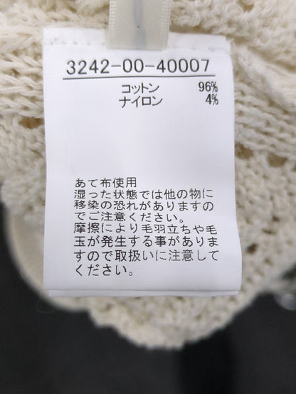 変形スリーブヘリンボーンニット