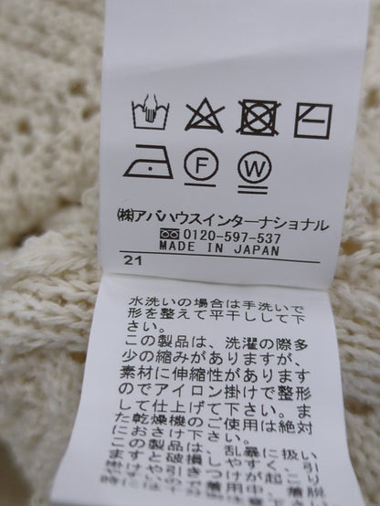 変形スリーブヘリンボーンニット