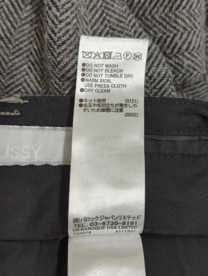 LOOSE TAPERED TROUSERS