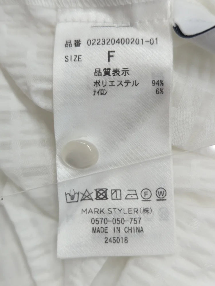 リボンタイラッフルブラウス