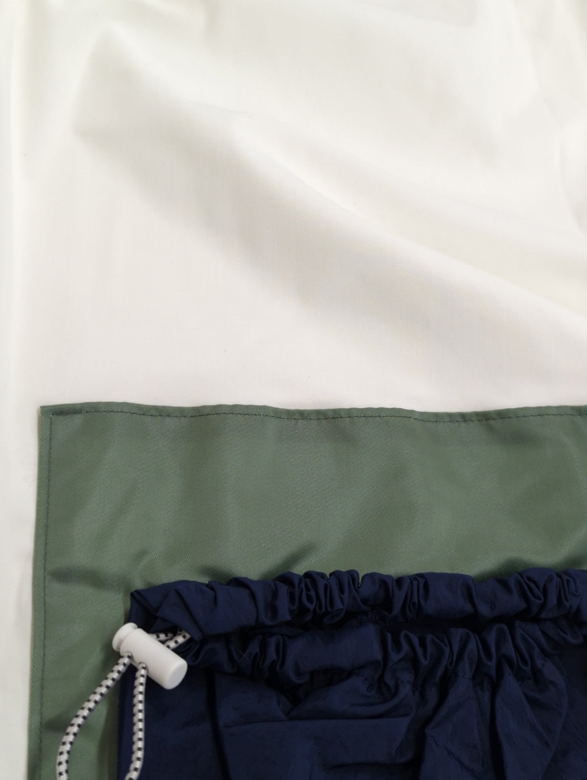 DRAWSTRING POCKET TOP
