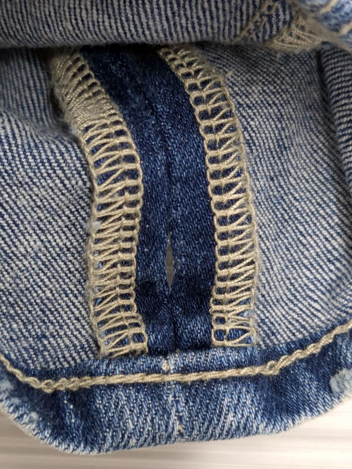 H/W ウエストクロススキニーデニムパンツ
