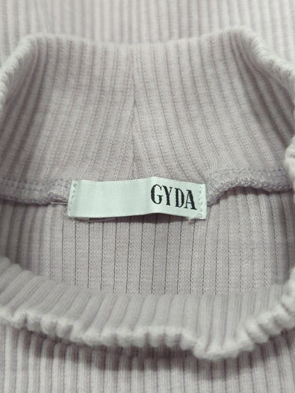 Muoversi liberamenteテレコタートルトップス