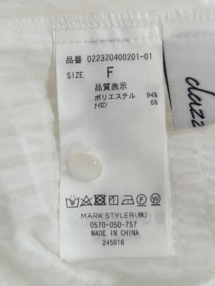 リボンタイラッフルブラウス