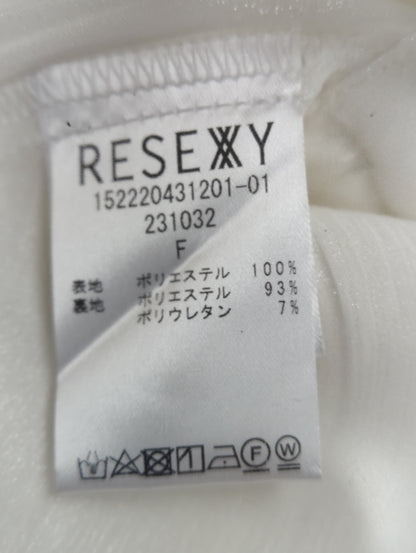 ラッフルシャイニーブラウス