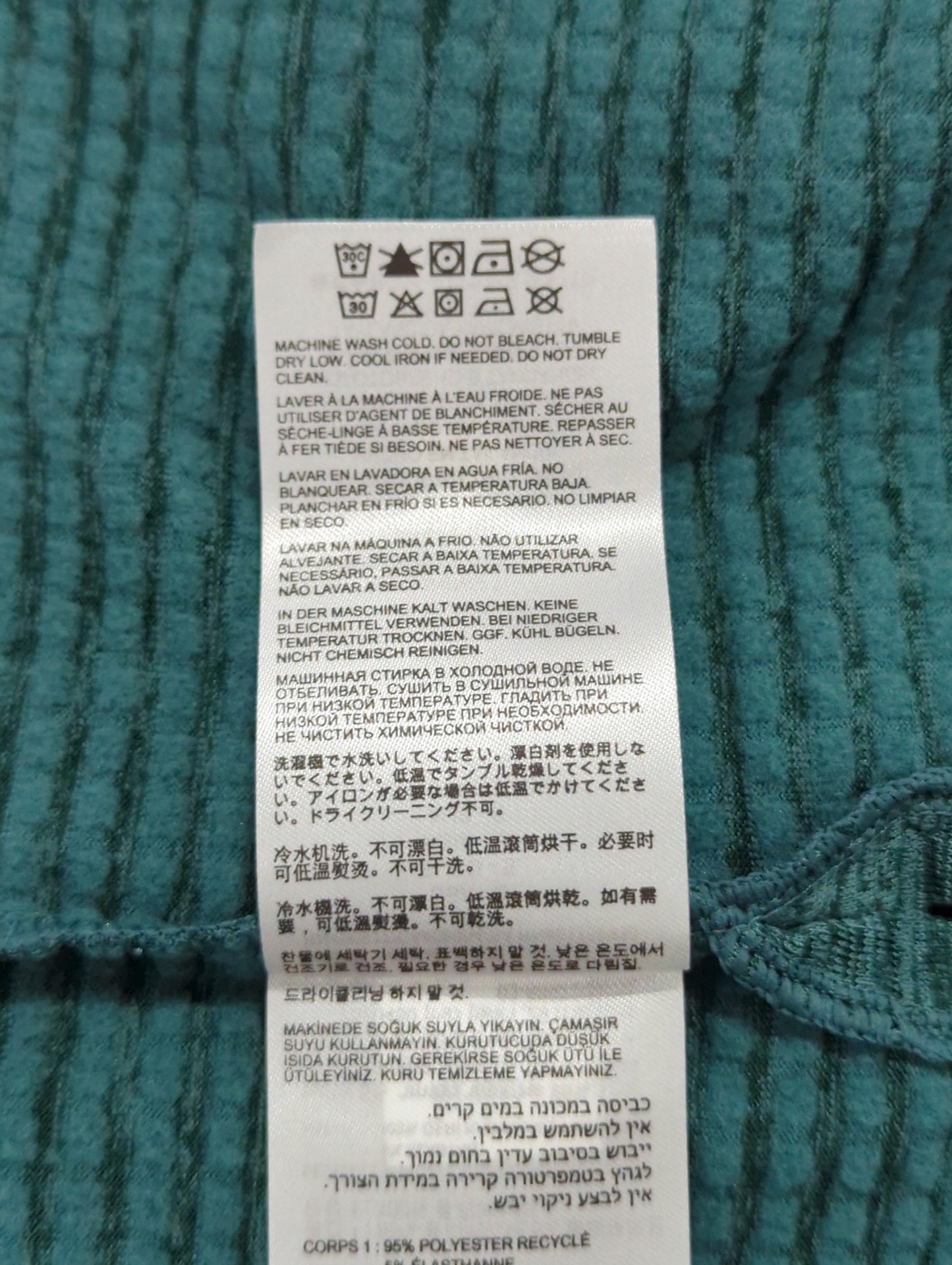 Heat Grid クオータージップトップ