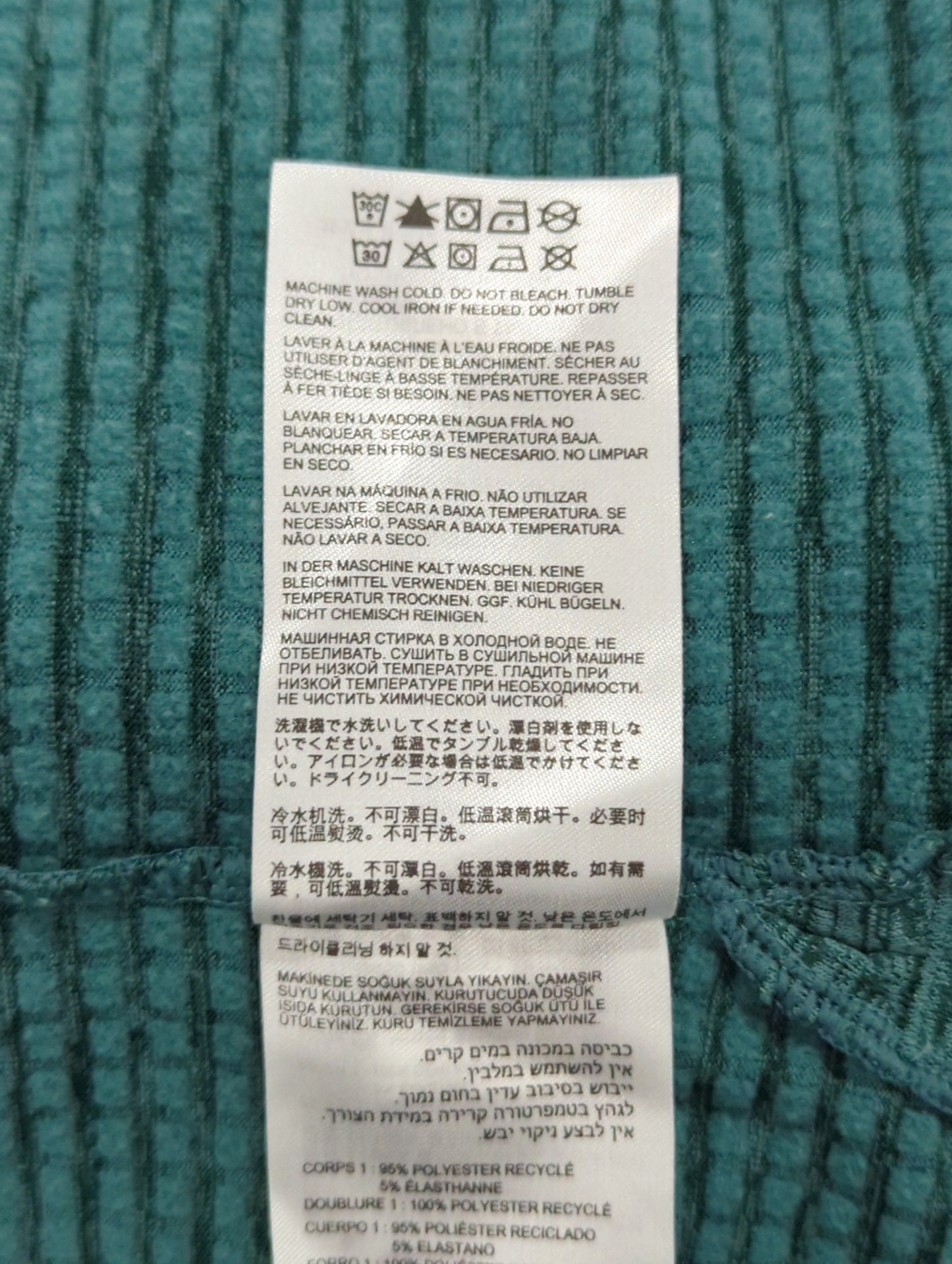 Heat Grid クオータージップトップ