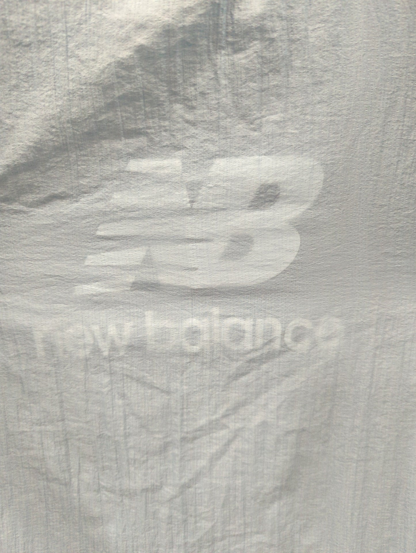 NB Grey ウーブン Tシャツ