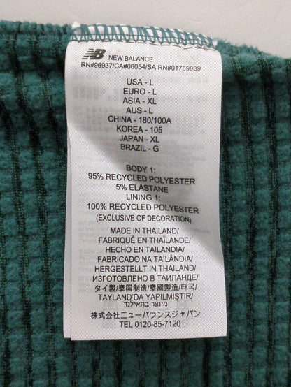 Heat Grid クオータージップトップ