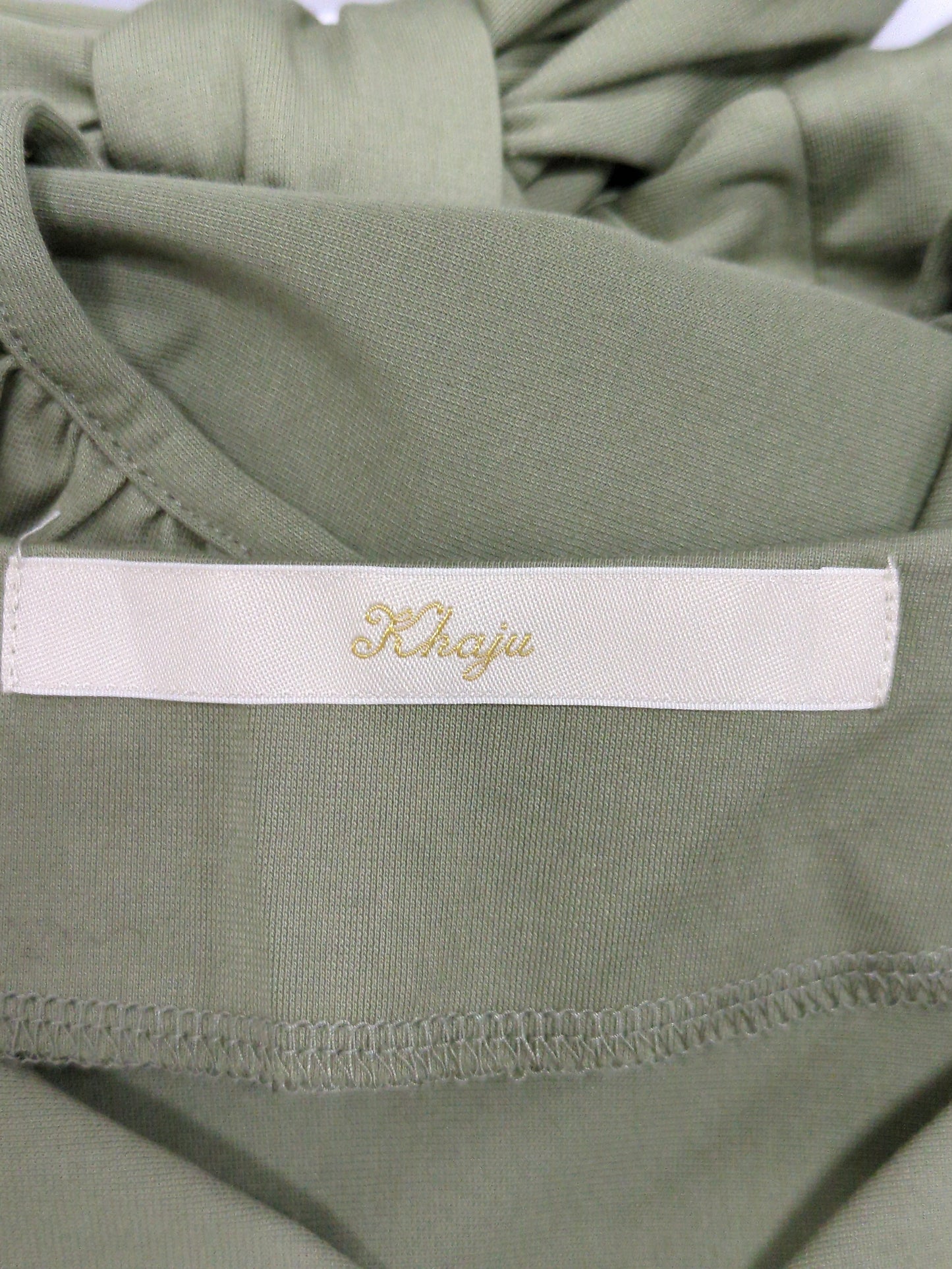 Khaju:バックオープンリボンプルオーバー