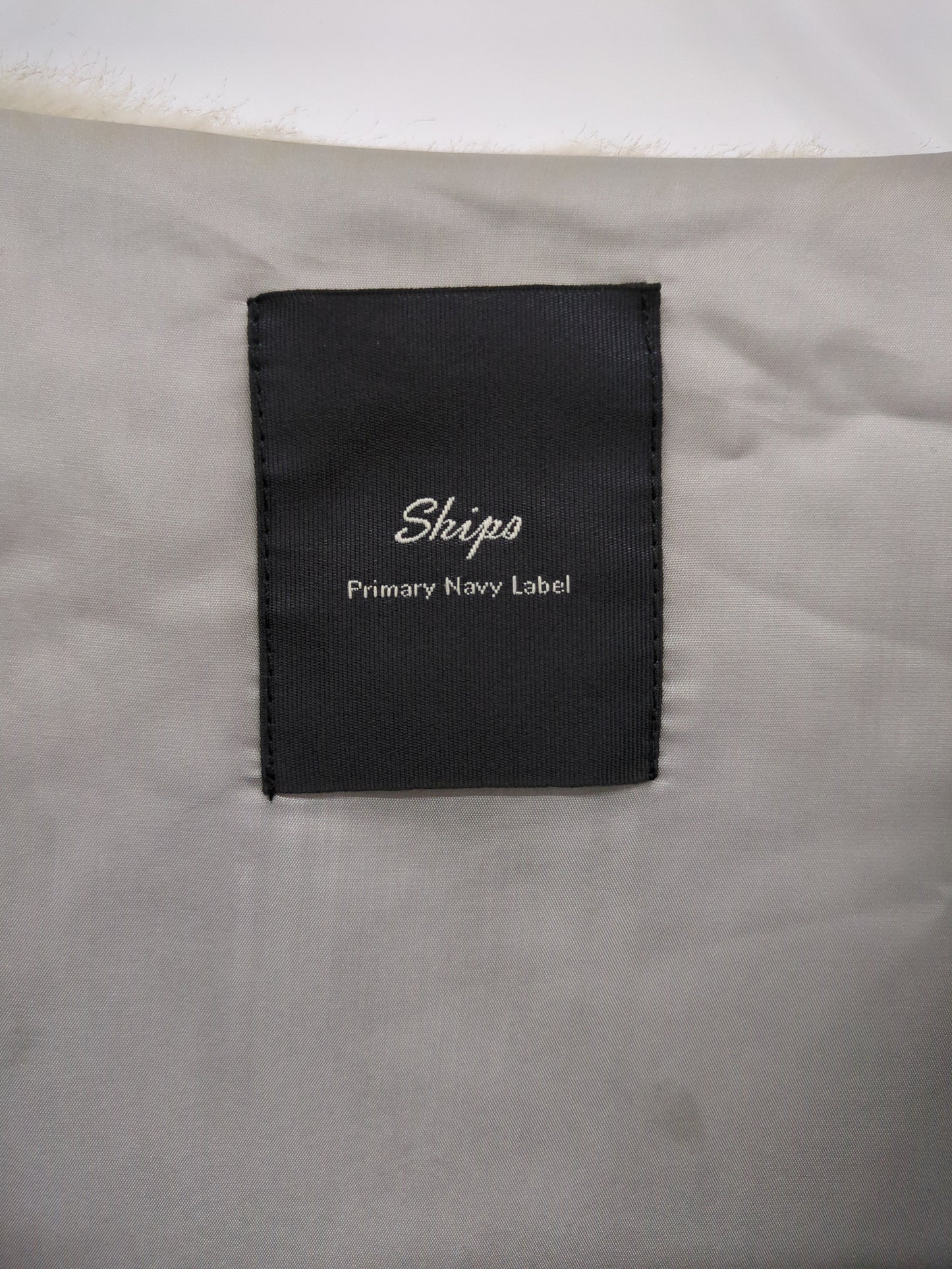 SHIPS Primary Navy Label:フェイク ファー ジレ