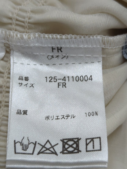 プリーツラッフルブラウス