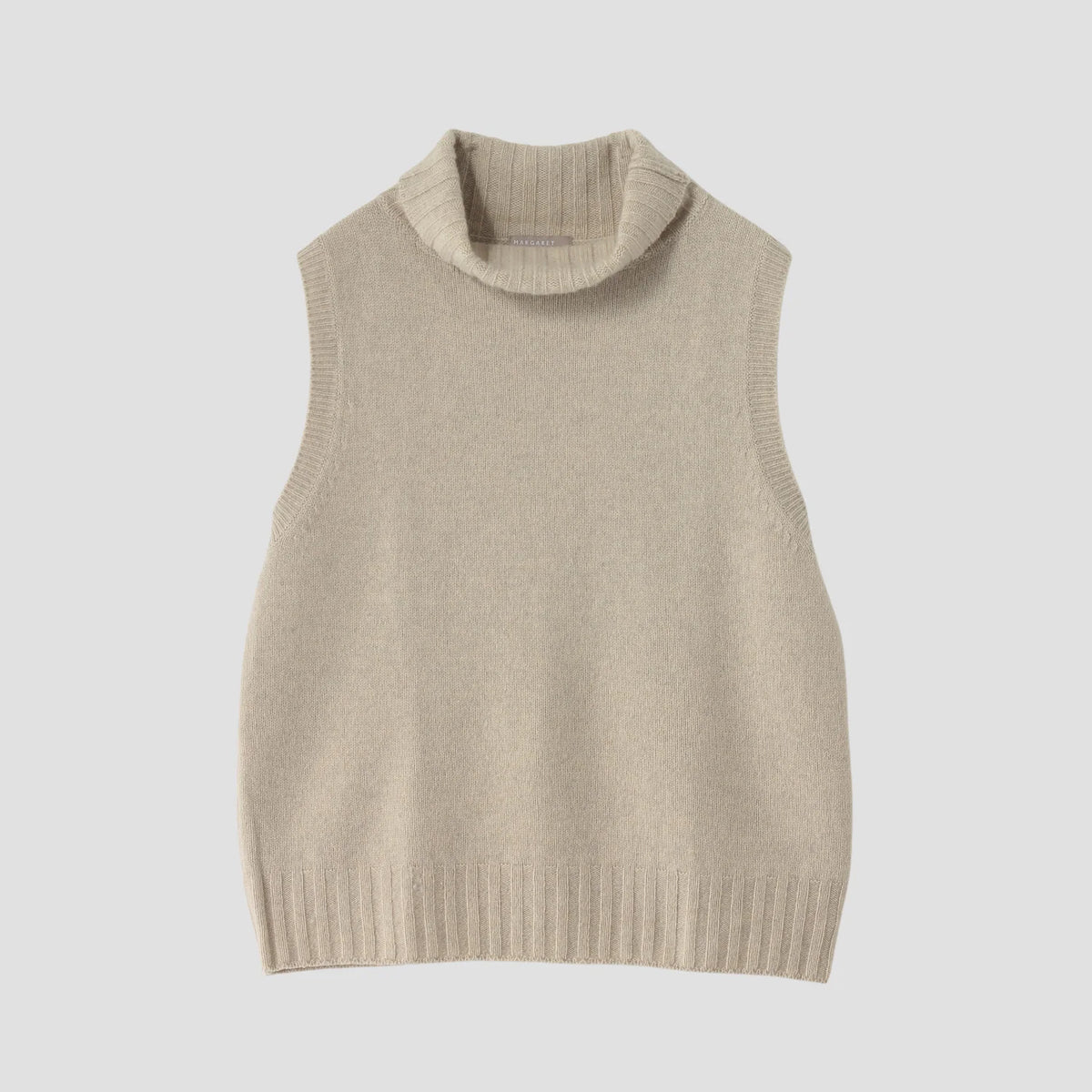 SLEEVELESS ROLL NECK KNIT