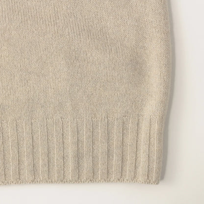 SLEEVELESS ROLL NECK KNIT