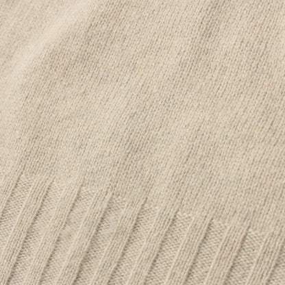 SLEEVELESS ROLL NECK KNIT