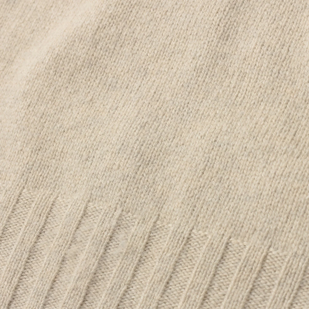 SLEEVELESS ROLL NECK KNIT