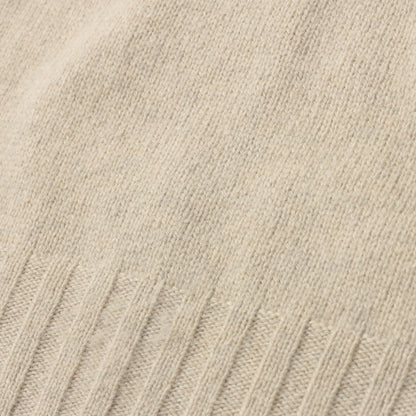 SLEEVELESS ROLL NECK KNIT
