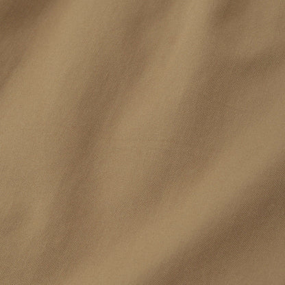WORN COTTON GABARDINE TROUSERS