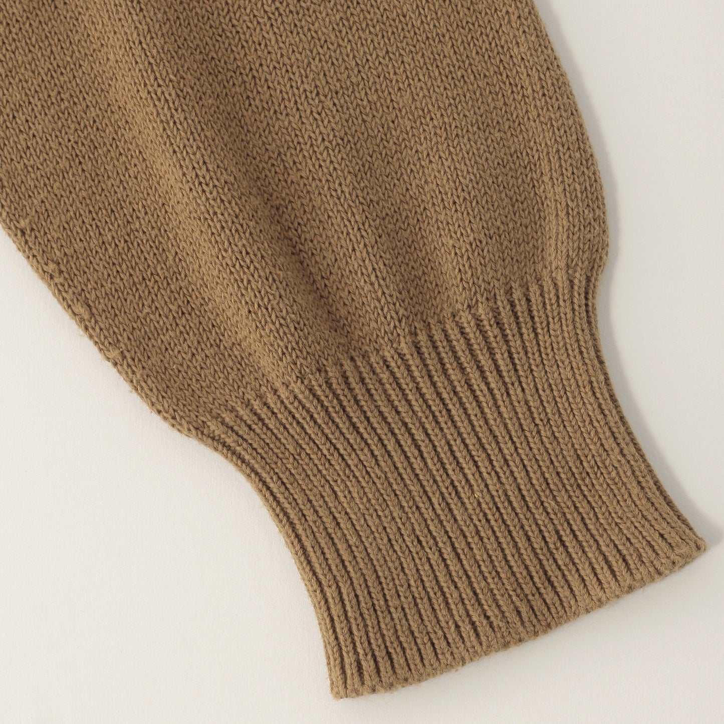 CAST OFF ROLL NECK KNIT