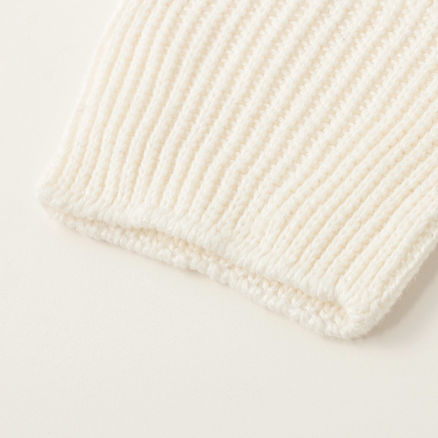 CAST OFF ROLL NECK KNIT