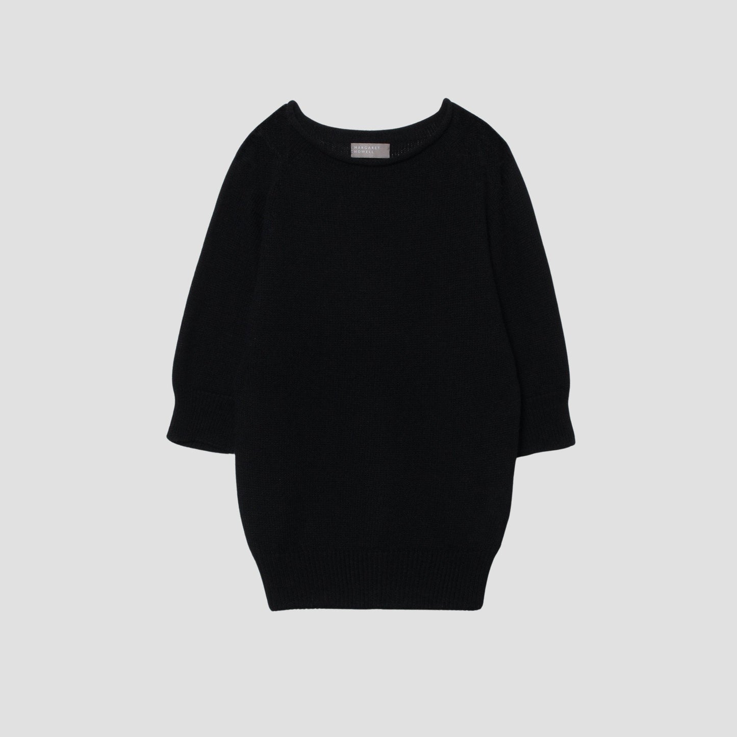 CAST OFF ROLL NECK KNIT