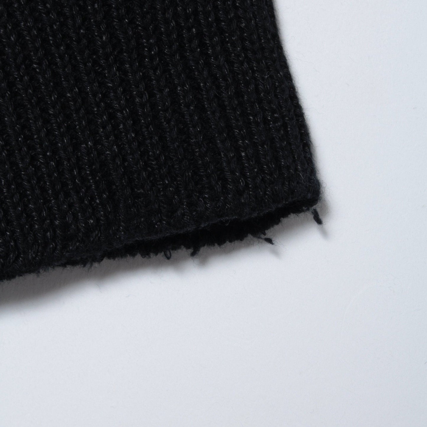 CAST OFF ROLL NECK KNIT