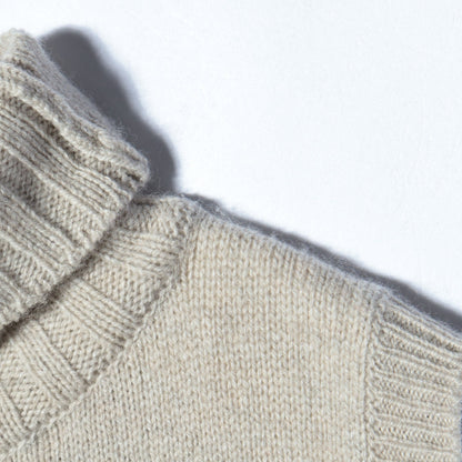 SLEEVELESS ROLL NECK KNIT