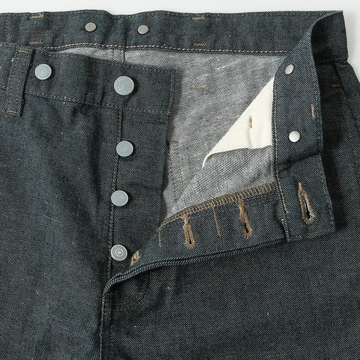 YELLOW CAST DENIM TROUSERS