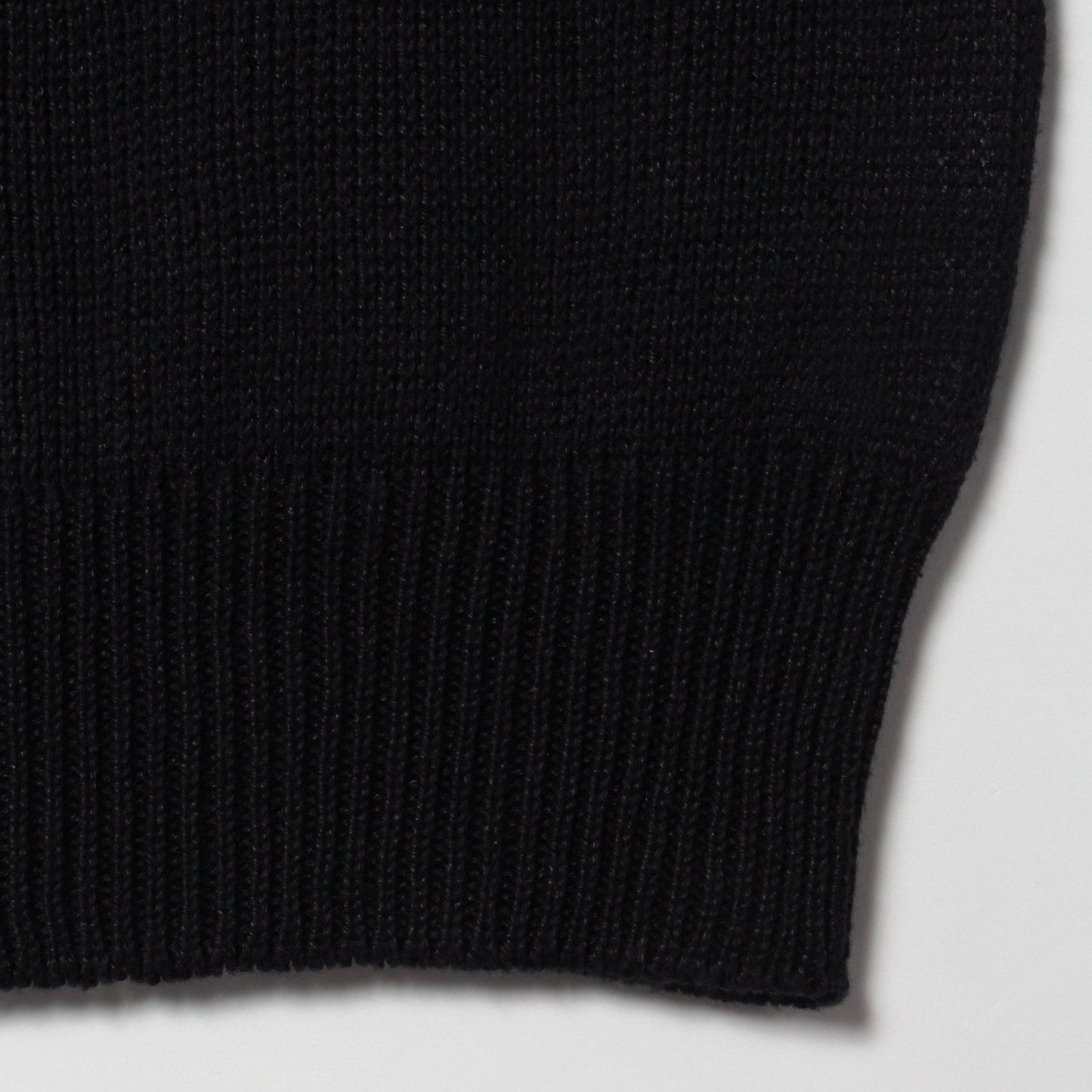 CAST OFF ROLL NECK KNIT