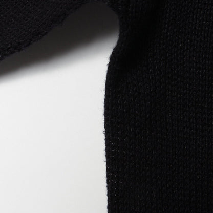 CAST OFF ROLL NECK KNIT