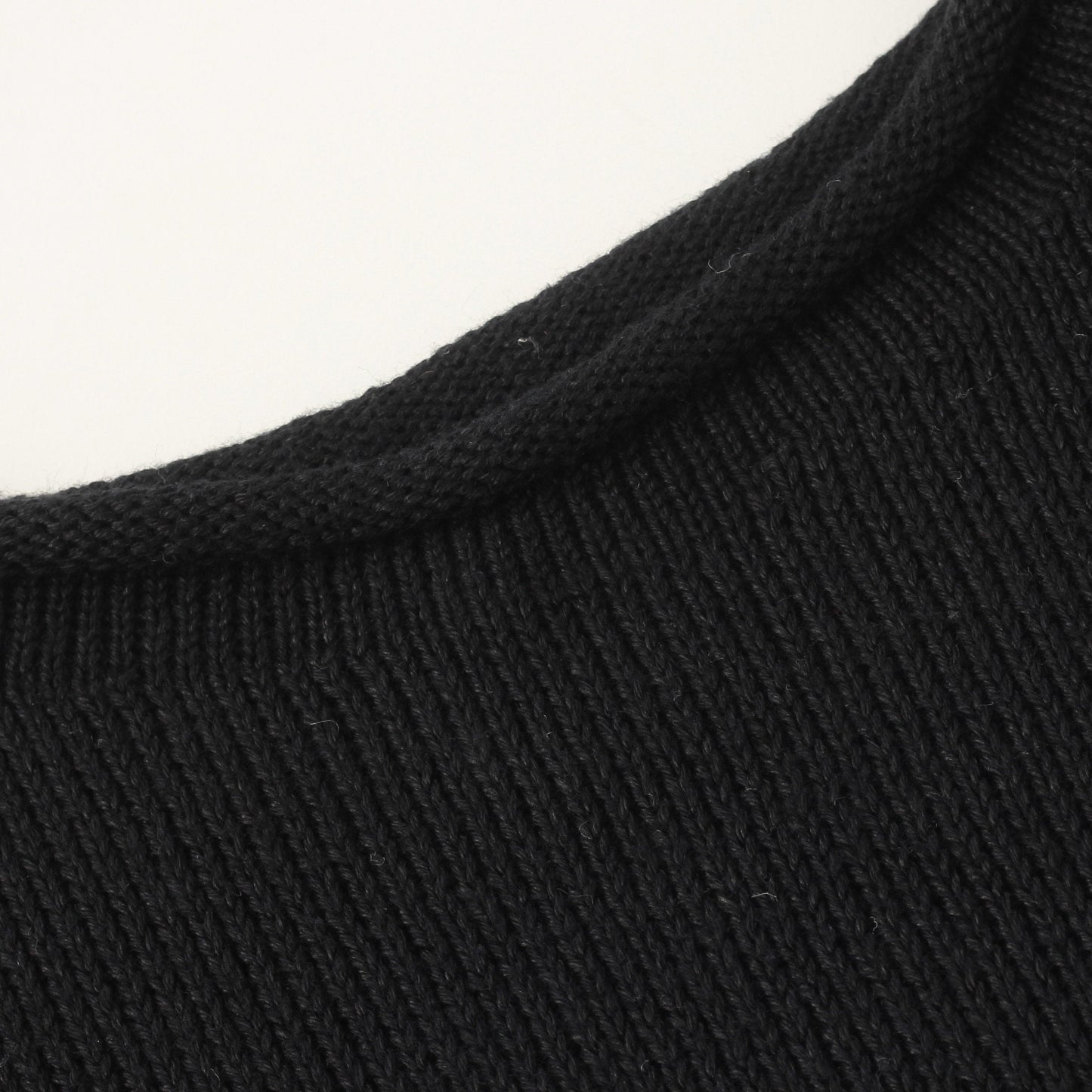 CAST OFF ROLL NECK KNIT