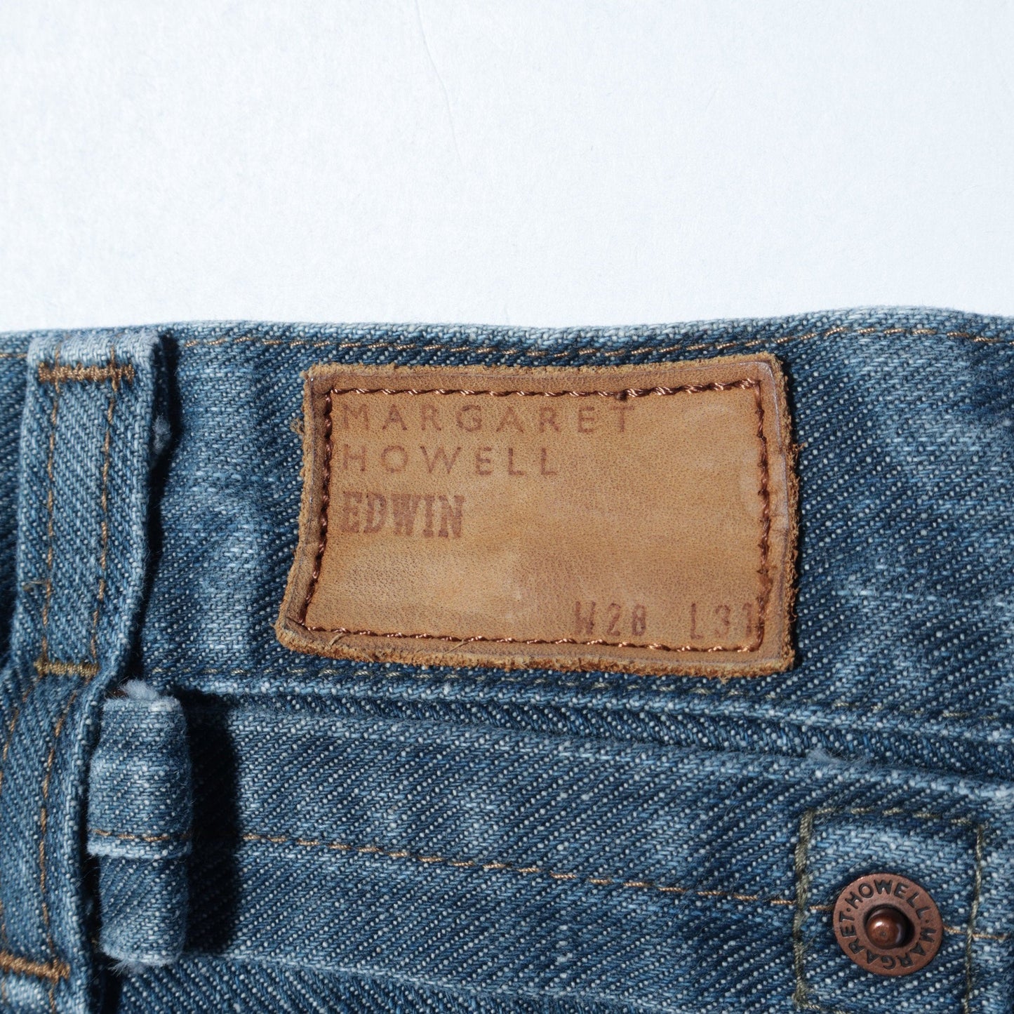 GREY CAST DENIM TROUSERS
