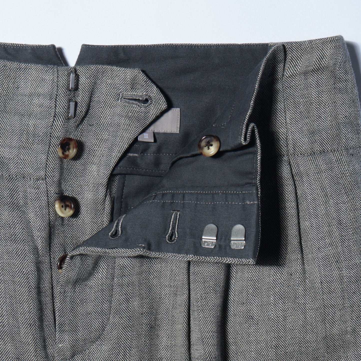 CLEAN HERRINGBONE TROUSERS