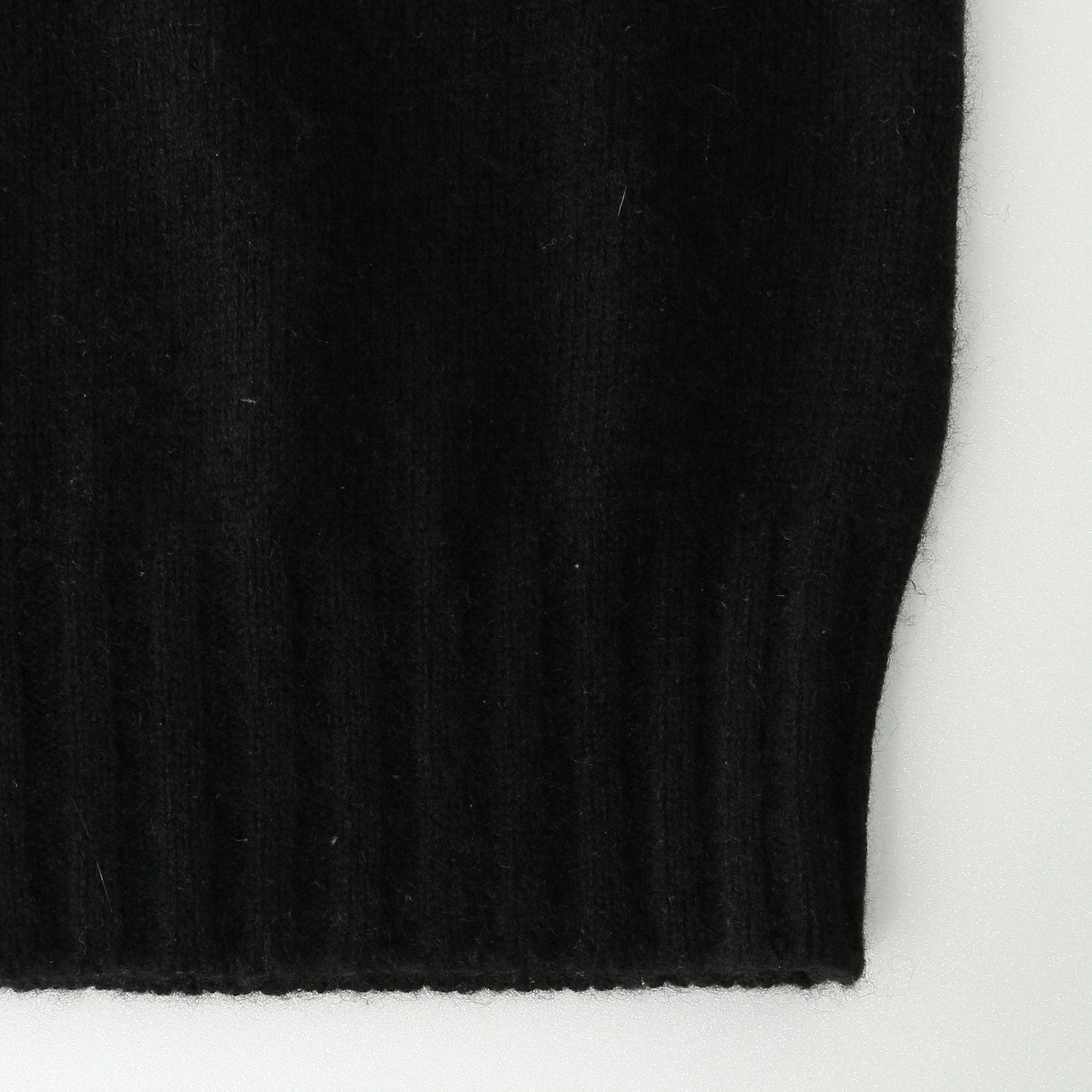CASHMERE SLEEVELESS ROLL NECK KNIT
