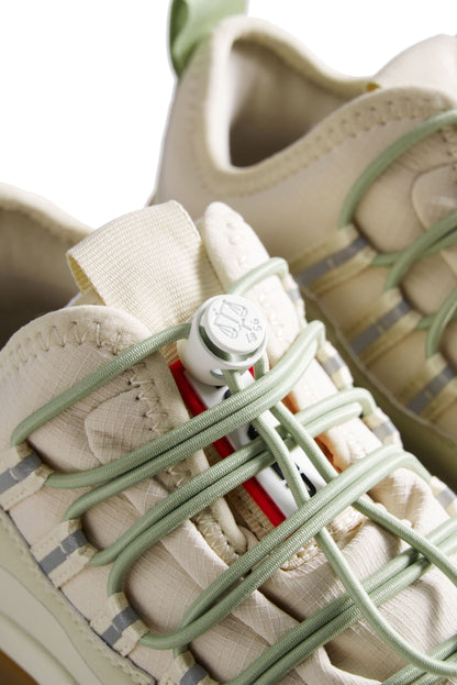 レディース トラベル ミッド トレーナー